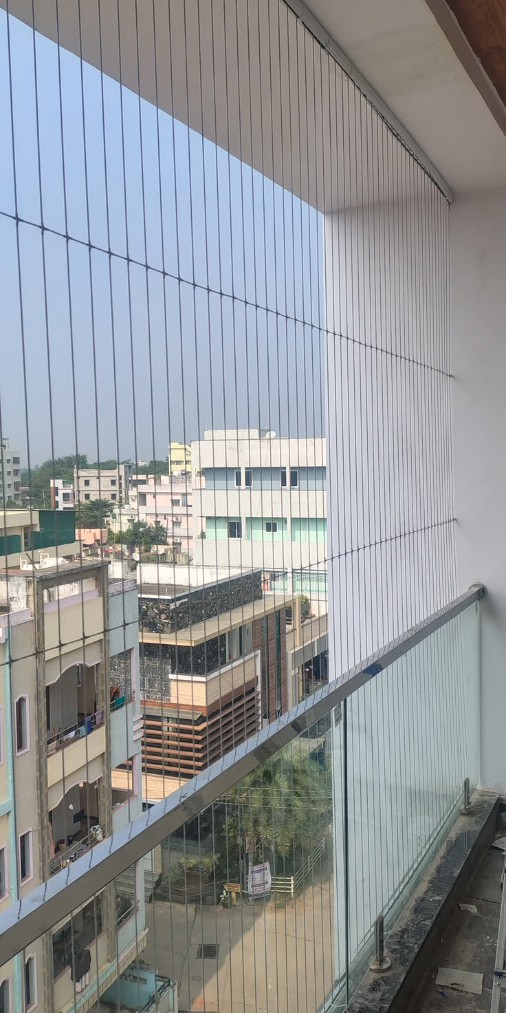 Invisible grills safety nets installation in Bengaluru for balcony and window protection